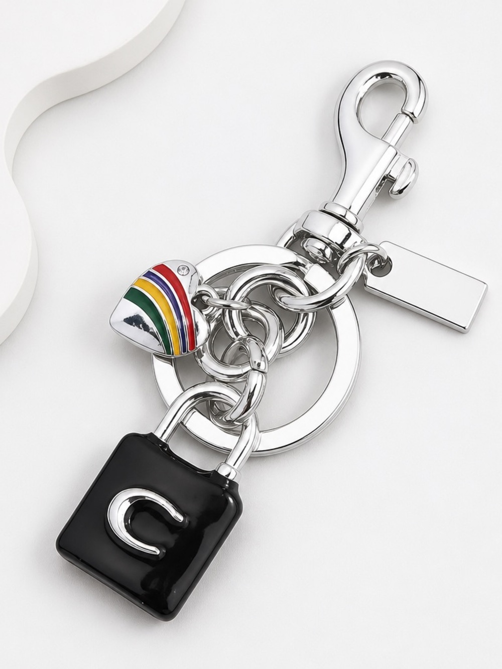 Coach Silver Keychain with Black Padlock and Rainbow Heart Charm